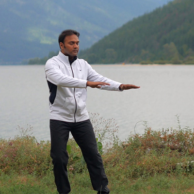 qigong practice demonstration at a lake